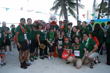 Participants at last year's Corporate Run/Walk sport their Team UM T-shirts.