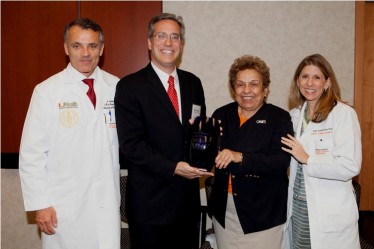 Celebrating the 2013 Batchelor Award are, from left, Dean Pascal J. Goldschmidt, recipient Michael S. Kapiloff, UM President Donna E. Shalala, and Judy Schaechter, interim chair of pediatrics.