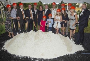 Thomas P. Murphy, seventh from left, is joined by his family and UM officials, including President Julio Frenk, Board of Trustees Chair Stuart Miller, and School of Architecture Dean Rodolphe el-Khoury, at the groundbreaking ceremony for the new design studio building that will open in the spring of 2017.