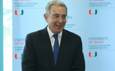Alvaro Uribe addresses the MBA class.